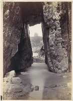 Free download [View Through Rocks Of Tower On Hill] free photo or picture to be edited with GIMP online image editor